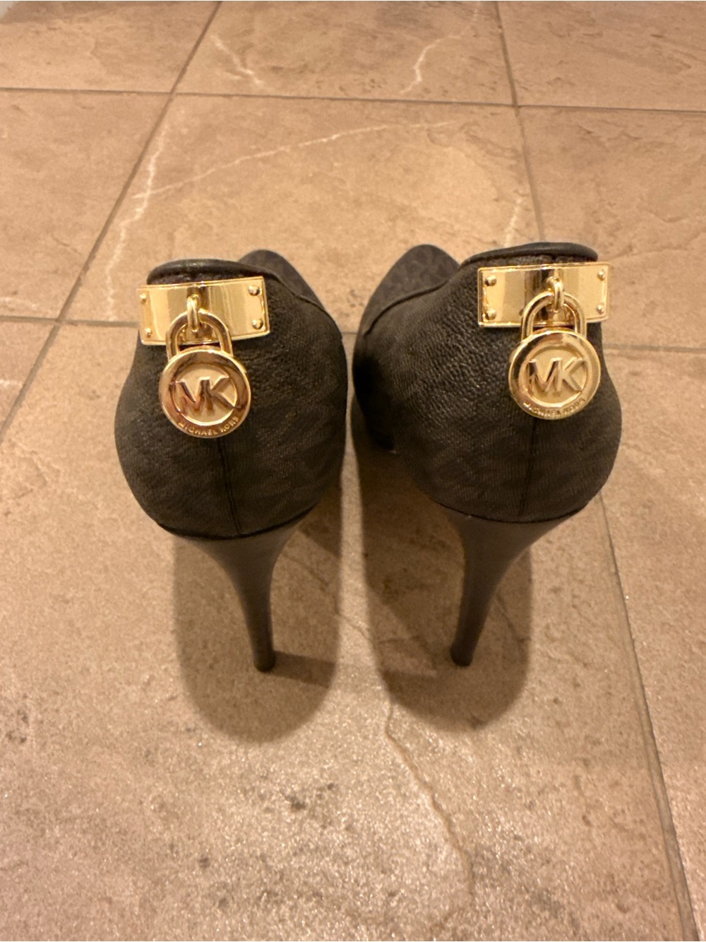 Michael Kors Black Pointed-Toe Stiletto Heels with Gold MK Charms